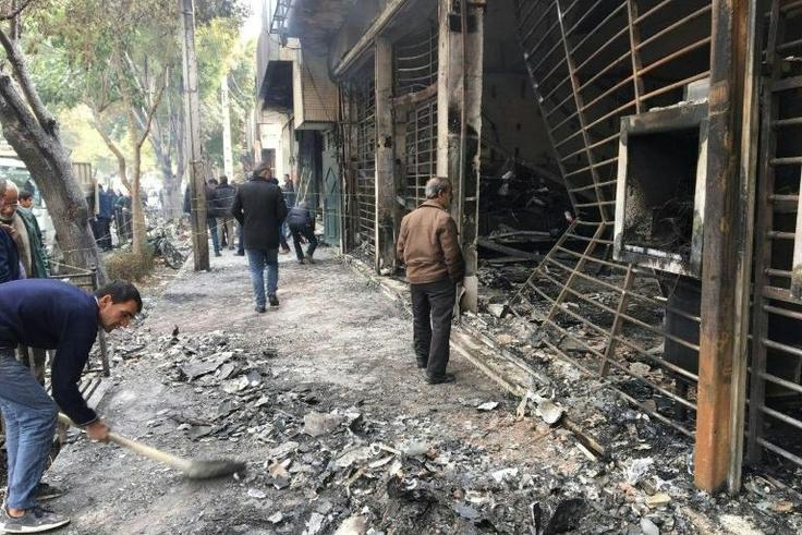 This bank was set ablaze by protesters in Iran's central city of Isfahan