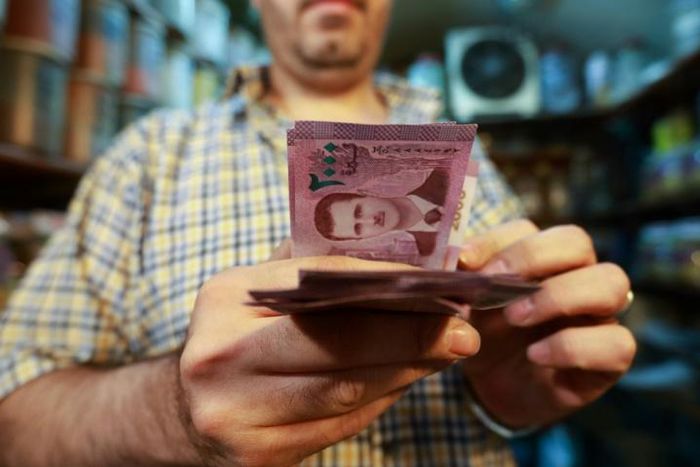 The Syrian pound, which traded at around 48 to the dollar when civil war broke out in 2011, was trading at a record low of 1,000 to the greenback at some exchange bureaus on Tuesday
