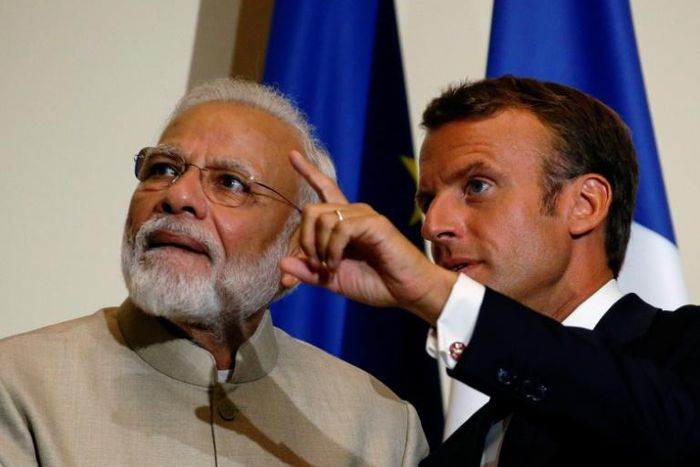 France will be keeping an eye on rights issues in divided Kashmir, President Emmanuel Macron told India's Narendra Modi