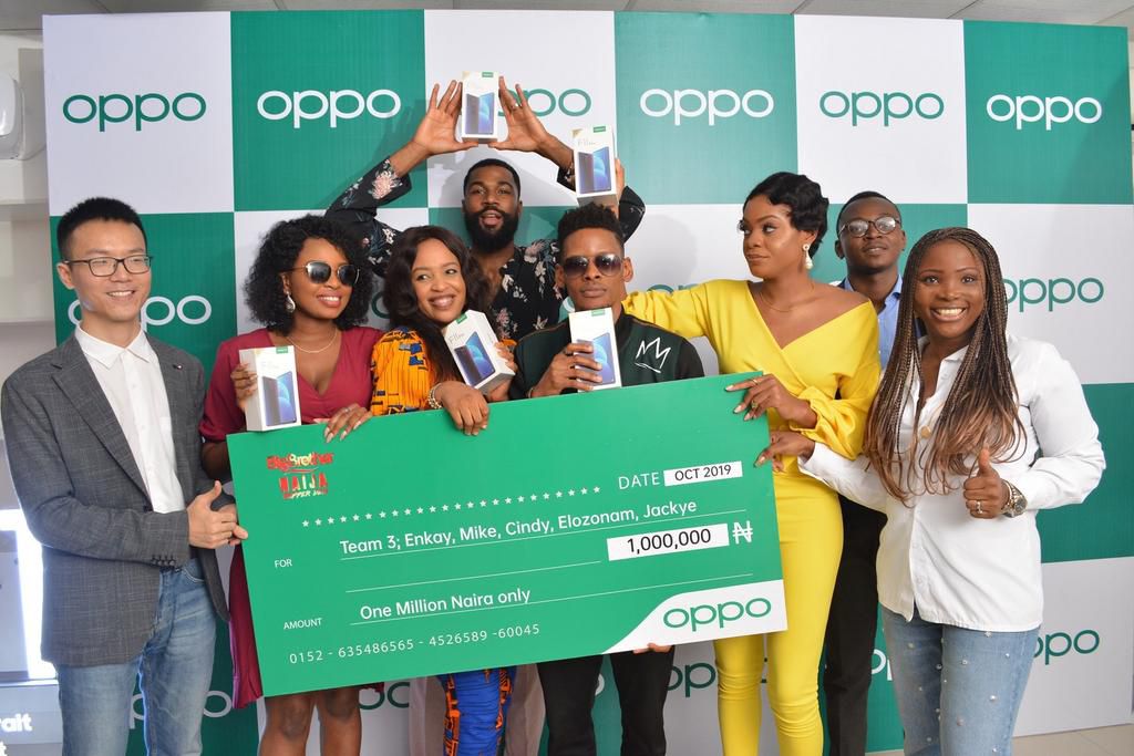 Team Enkay, winners of the OPPO Fashion Runway task posing with their cheque today at the OPPO Head Office, Lagos