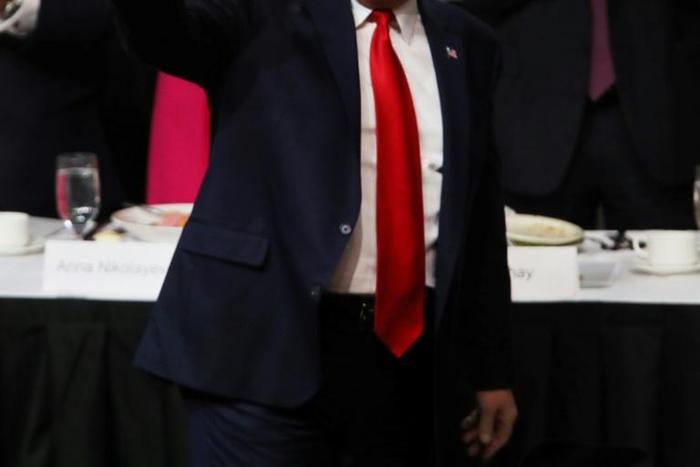 President Donald Trump says the impeachment investigation that threatens him is a "delusional witch hunt'