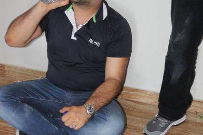 Koudeih was arrested by the EFCC from the rooftop (Twitter: @officialEFCC)