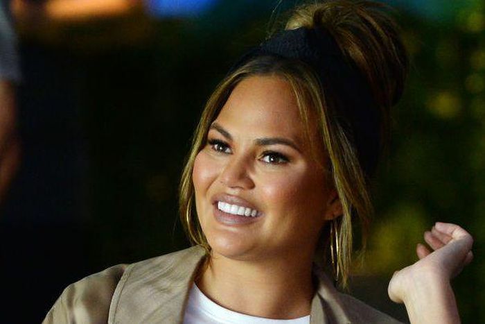 Chrissy Teigen Calls BS On Chocolate Bar Machine