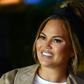 Chrissy Teigen Calls BS On Chocolate Bar Machine