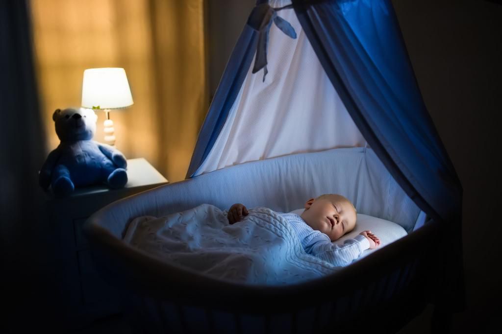 Cute baby boy sleeping at night