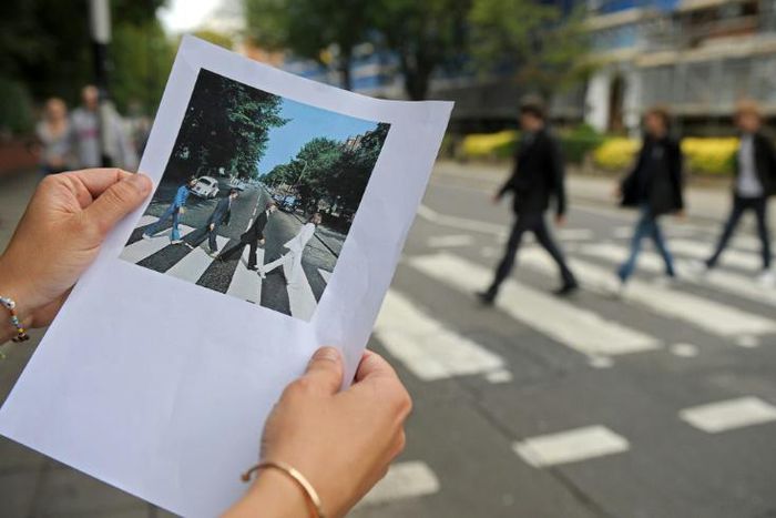 Abbey Road has drawn Beatles pilgrims from across the world, with countless fans having walked over the zebra crossing, replicating the picture