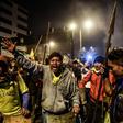Indigenous people celebrate in Quito on October 13, 2019 after Ecuador's president and indigenous leaders reached an agreement to end violent protests