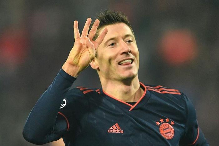 Bayern Munich forward Robert Lewandowski celebrates scoring four goals in 15 minutes in Tuesday's 6-0 win at Red Star