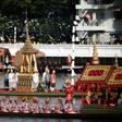 Thai oarsmen row during the first full dress rehearsal for the Royal barge ceremony along the Chao Phraya river in Bangkok