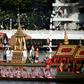 Thai oarsmen row during the first full dress rehearsal for the Royal barge ceremony along the Chao Phraya river in Bangkok