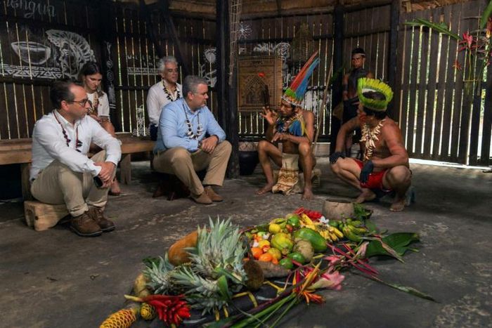 Colombian President Ivan Duque (C-L) meeting with indigenous leaders before a summit on protecting the Amazon in Leticia, Colombia, on September 6, 2019