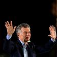 Argentina's President Mauricio Macri waves at supporters during the closing rally of his campaign in Cordoba, Argentina on October 24
