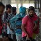 Indian nationals arrive at Indira Gandhi International airport after being deported from Mexico