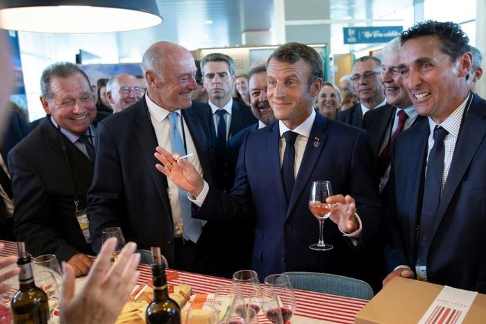 French President Emmanuel Macron sampling local wines in Agnlet, in the heart of Bordeaux, in August. He reportedly told winegrowers there would be no Dry January campaign