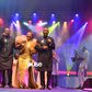 From left: Panam Percy Paul, Esther Osaji, and Ron Kenoly perform together at the Hallelujah Concert 2019