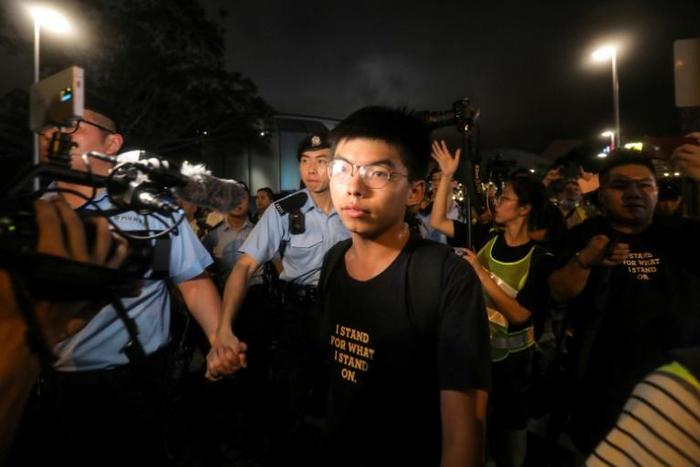 Leading Hong Kong pro-democracy activist Joshua Wong has been arrested again, a day ahead of a banned protest rally in the city