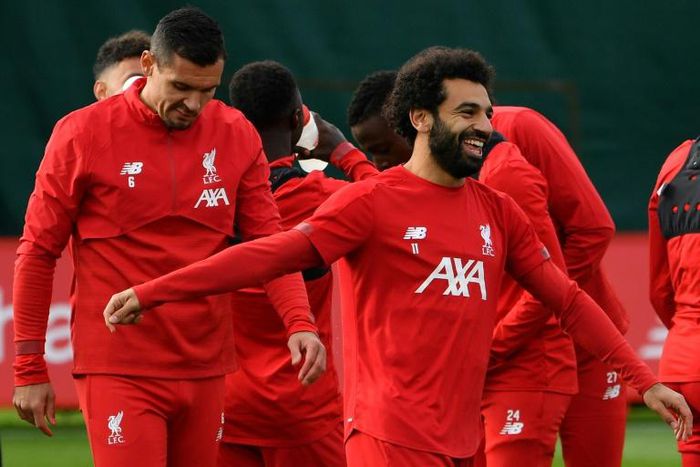 Dejan Lovren (L) and Mohamed Salah start for Liverpool against Genk after taking part in training on the eve of the game in Belgium