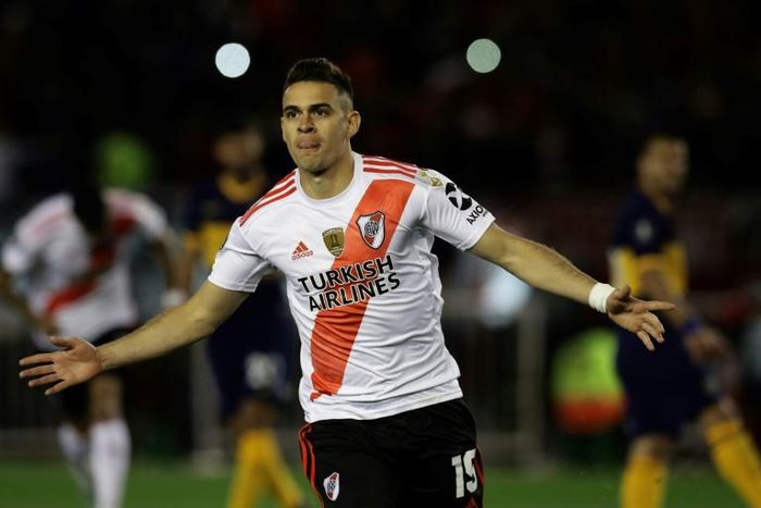 River Plate's Colombian Rafael Santos Borre celebrates after scoring a penalty against Boca Juniors during their all-Argentine Copa Libertadores semi-final first leg football match at the Monumental stadium in Buenos Aires, on October 1, 2019.