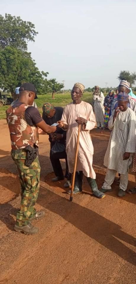 Nigerian soldier checks Nigerians for identification in the northeast region as part of Operation Positive Identification [Nigerian Army]