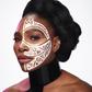 Nigerian visual artist Laolu Senbanjo marks Serena Williams with his signature tribal designs [Credit: Essence]