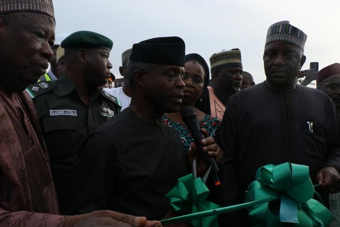 Vice-President Yemi Osinbajo and Kano state Governor, Umar Ganduje at the inauguration of the [Twitter/@realREANigeria]