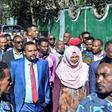 Jawar Mohammed, centre, among supporters who had gathered outside his home in Addis on Thursday. He has accused security forces of trying to orchestrate an attack against him