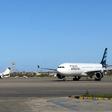 Grounded planes sit on the tarmac at Mitiga International Airport near the Libyan capital Tripoli