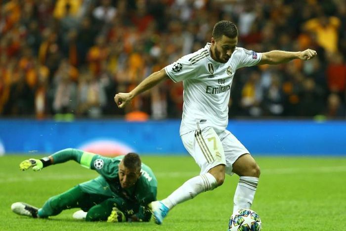 Real Madrid's Belgian forward Eden Hazard beat Galatasaray goalkeeper Fernando Muslera but then hit the crossbar