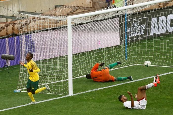 A file photo of South African Teboho Mokoena (L) celebrating scoring against the Seychelles in a 2019 Africa Cup of Nations qualifier