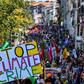Demonstrators take part in a climate march in Hendaye, south-west France on August 24, 2019, to protest against the annual G7 Summit
