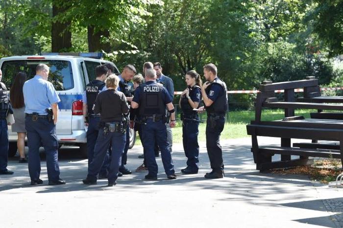 Police stand at the Berlin crime scene in August 2019 where a Georgian man who had fought against Russian forces in Chechnya was shot