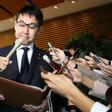Japan's Justice Minister Katsuyuki Kawai speaks to journalists after submitting his resignation in Tokyo