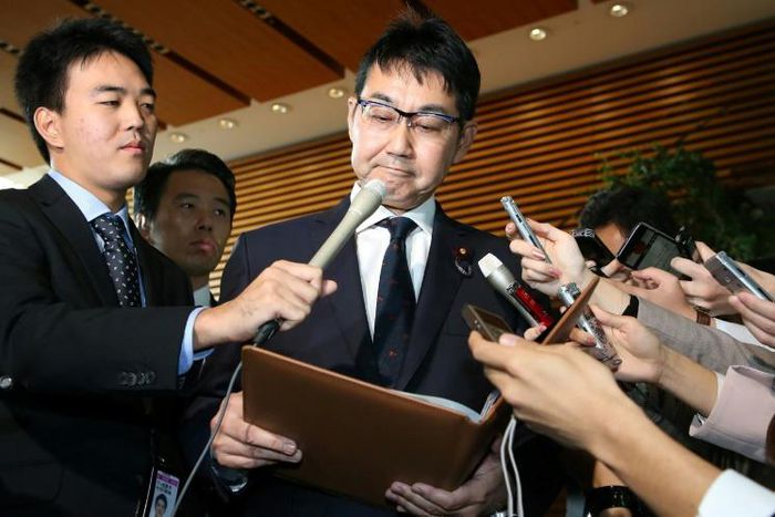 Japan's Justice Minister Katsuyuki Kawai speaks to journalists after submitting his resignation in Tokyo