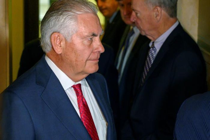 Former US secretary of state Rex Tillerson enters the courtroom to testify in the Exxon trial on October 30, 2019 in New York