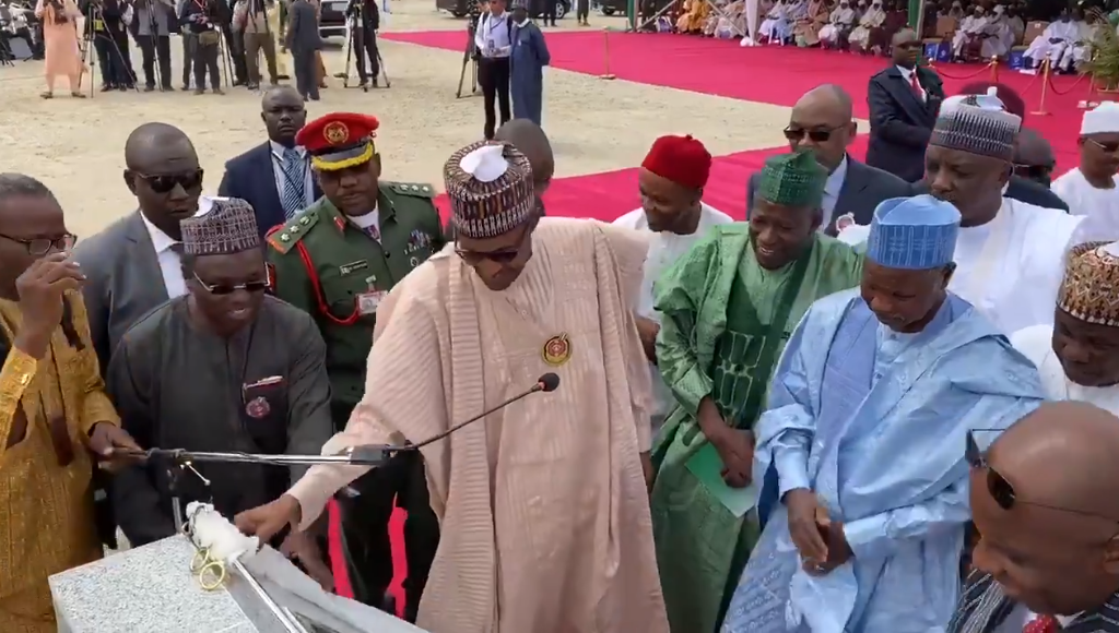 President Muhammadu Buhari performs the groundbreaking ceremony for the construction of University of Transportation, Daura. [Twitter/@BashirAhmaad]