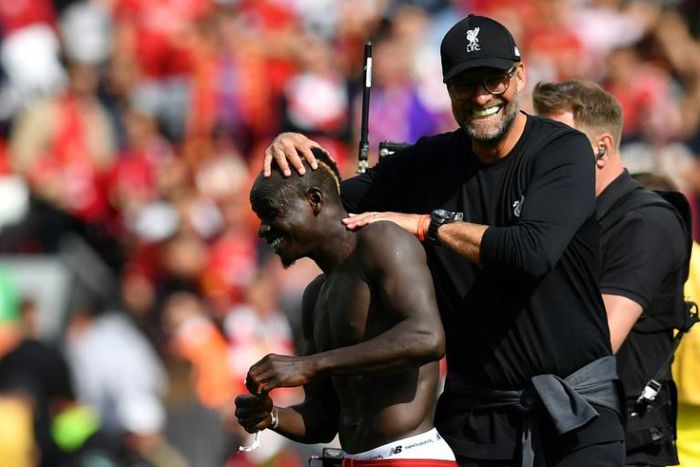 Liverpool manager Jurgen Klopp congratulates Sadio Mane after his two goals against Newcastle at Anfield