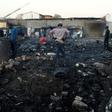 Foreigners in Marabastad, in the Pretoria area, try to save their belongings after their shacks were set alight in last month's attacks