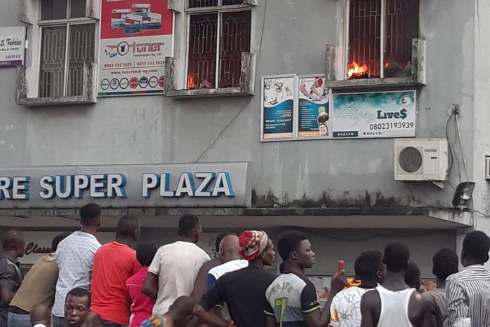Plaza opposite popular small market goes up in flame in Akerele, Surulere (HallaNaija Blog)
