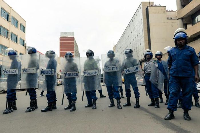 Riot police blocked off a nearby street as a crowd gathered for an address by opposition leader Nelson Chamisa
