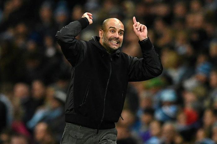 Pep Guardiola gestures on the touchline during Manchester City's Premier League match against Chelsea