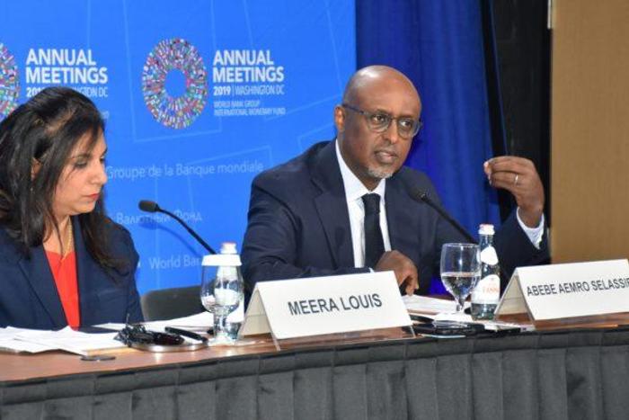 Mr Abebe Selassie, Director of the African Department at the IMF (right) with Ms Meera Louis, a Communications Officer at the Fund, during the media briefing. Photo: NAN