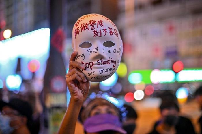 Hong Kong's leader outlawed face coverings at protests, invoking colonial-era emergency powers not used for half a century
