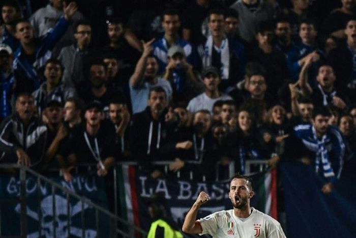 Juventus' Bosnian midfielder Miralem Pjanic replied with the winner after shouts of 'gypsy' from Brescia fans.