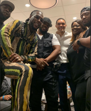 Burna Boy, Trevor Noah and other friends after his performance on 'The Daily Show.' (Instagram/Burnaboygram)