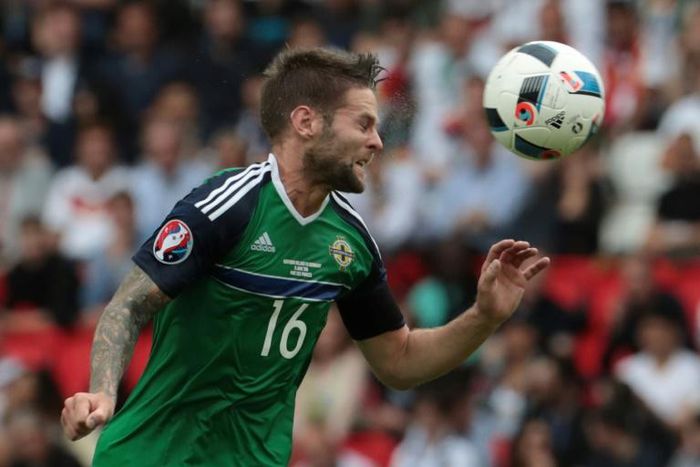 Oliver Norwood's decision to retire form international football at the age of 28 is a big mistake according to Northern Ireland manager Michael O'Neill
