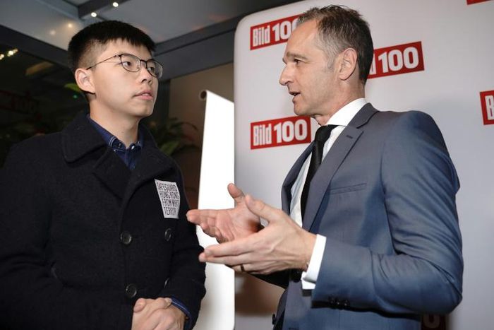 Beijing reacted angrily to the meeting between Hong Kong pro-democracy activist Joshua Wong (L) and German Foreign Minister Heiko Maas