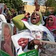 Demonstrators carried Sudanese flags and photographs of detained former regime officials, calling for their release