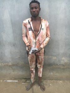 Olaitan Rilwan arrested with a pistol (NAN)