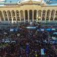 More than 20,000 demonstrators rallied outside the parliament building in Tbilisi urging the government to resign and calling for new legislative elections