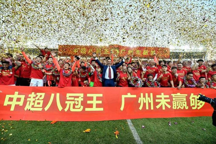 Guangzhou Evergrande celebrate winning their eighth Chinese Super League title